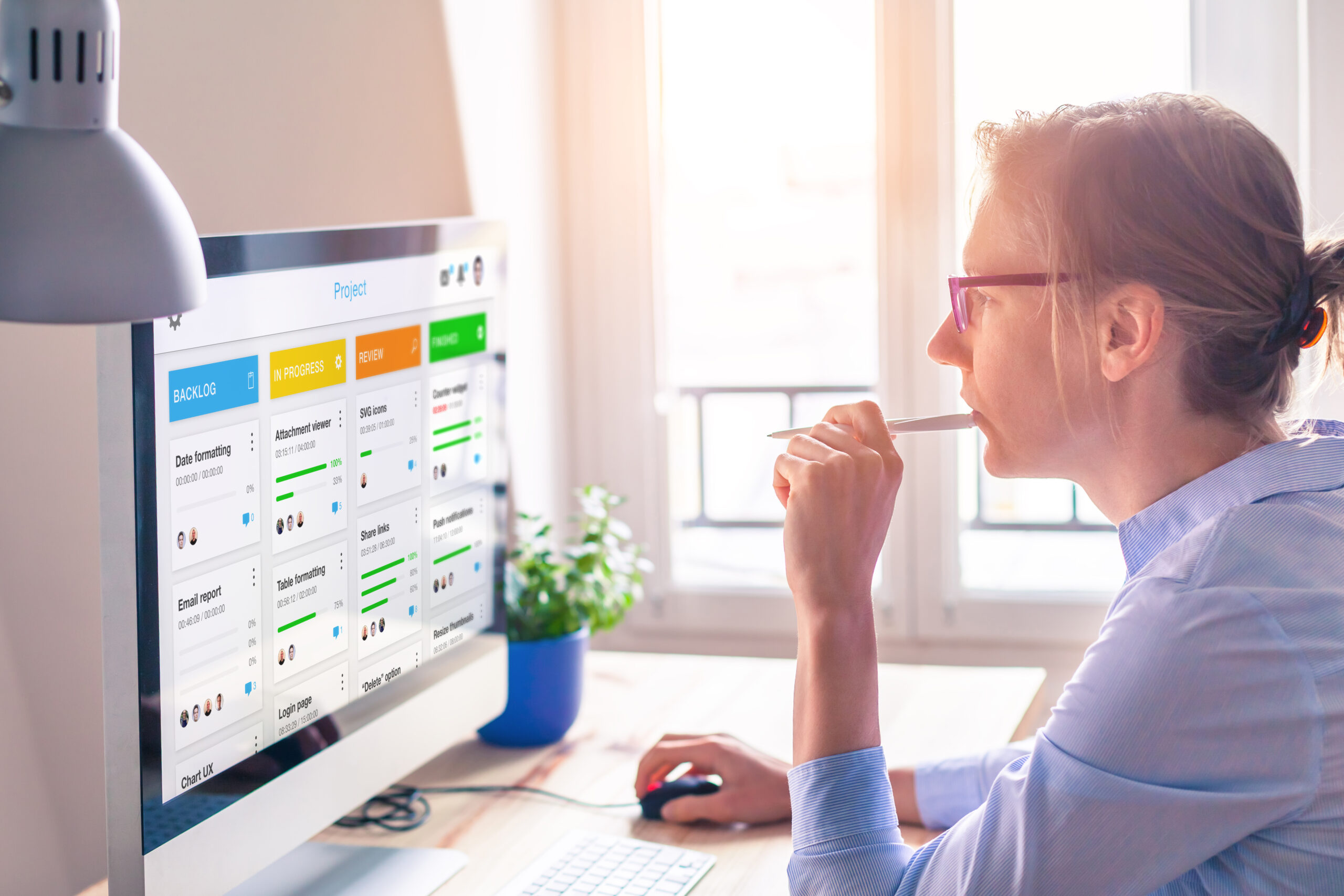Agile framework board for lean product development with scrum or kanban methodology, project management with iterative or incremental strategy, young woman working with computer